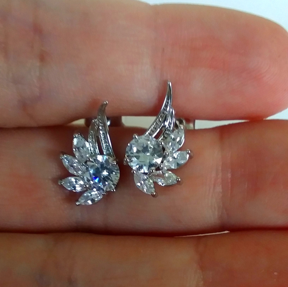 Silver angel wing studs